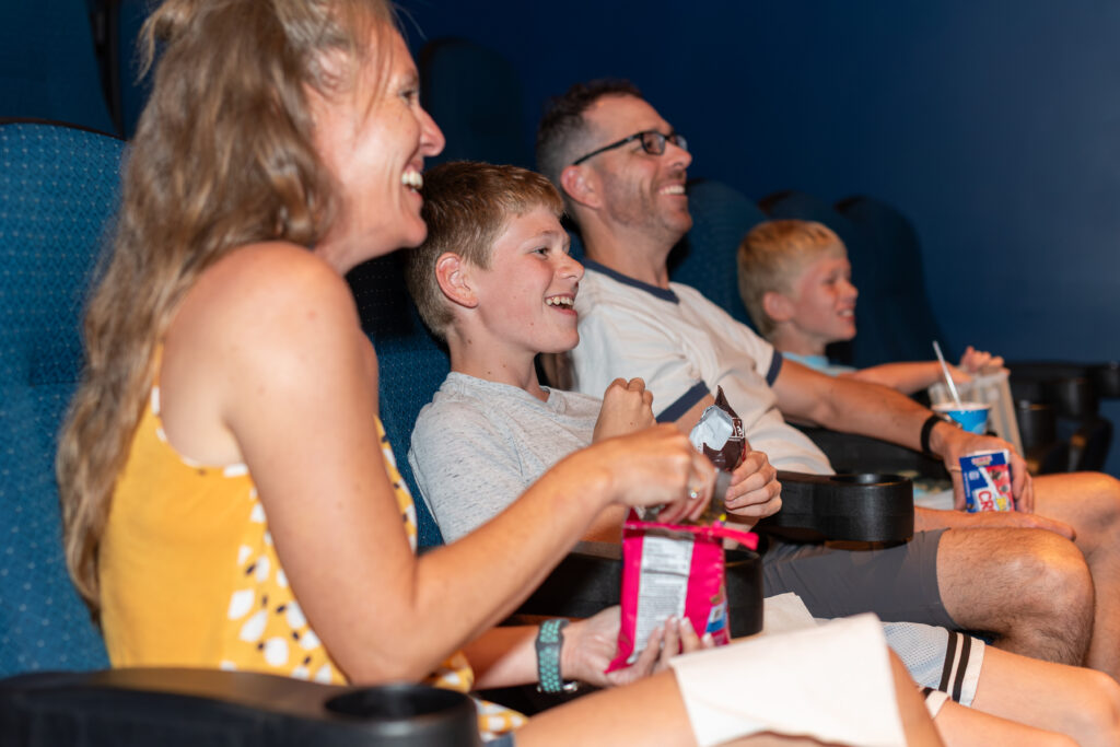 family in movie theater